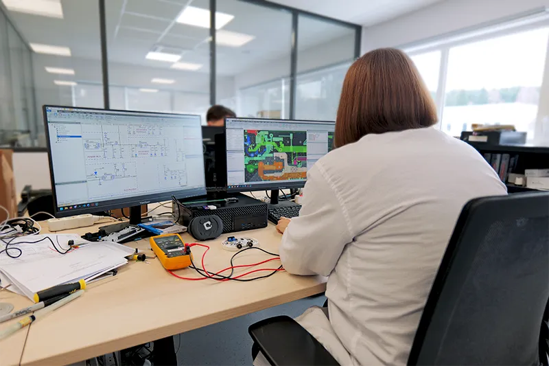 Mazet Santé R&D team engineer designing a medical or aesthetic device on a computer, showcasing French innovation
